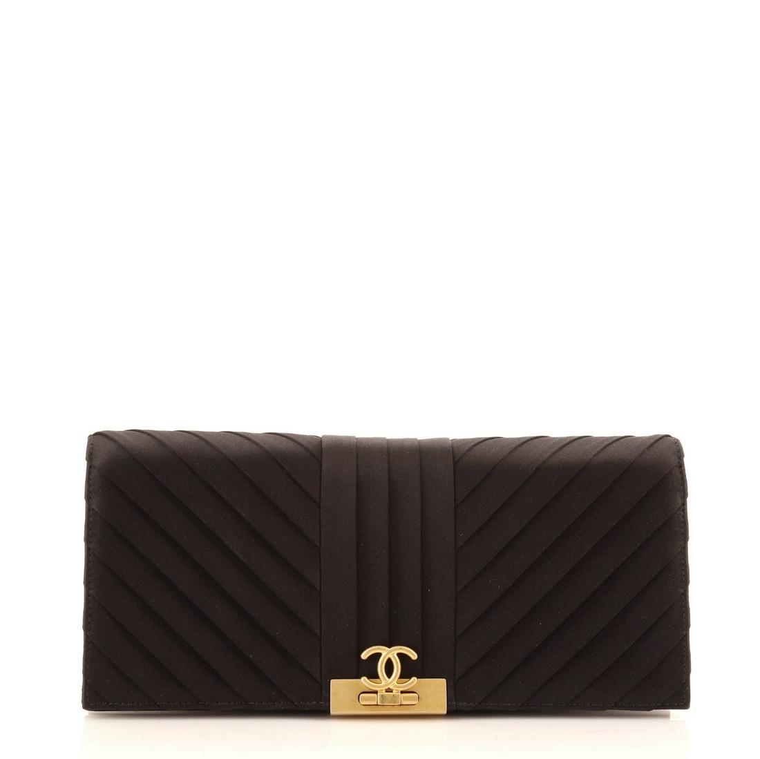 Chanel Chevron Pleated CC Flip Lock Flap Clutch Satin: Chanel Chevron Pleated CC Flip Lock Flap Clutch Satin Condition: Pre-owned - Excellent Faint indentations on front near hardware and rear, scratches on hardware. Exterior Color: Black Interior Color: