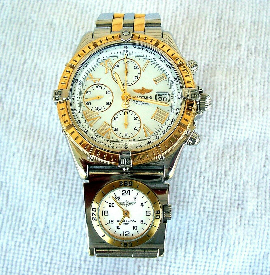 Pre-Owned Breitling D13055 Chronomat Windrider 2 Time: Pre-Owned Breitling D13055 Chronomat Windrider 2 Time Zone Stainless Steel 18K Gold Watch Pre-owned: An item that has been used previously. The item may have some signs of cosmetic wear, but is fully 
