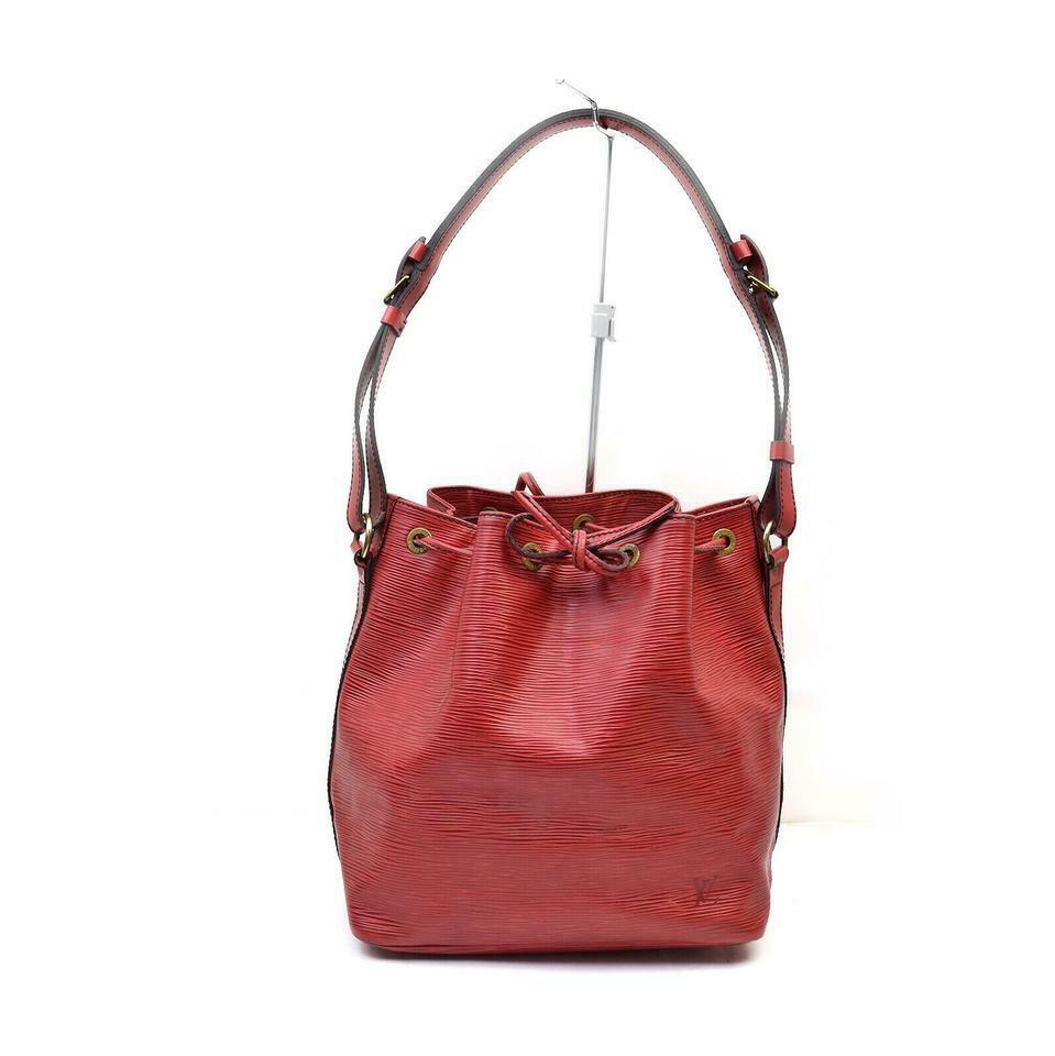 Pre-Owned Louis Vuitton Red Epi Leather Petit Noe: Pre-Owned Louis Vuitton Red Epi Leather Petit Noe Drawstring Bucket Hobo Bag 863204 Condition: Pre-owned: An item that has been used or worn previously. See the consignor's listing for full details an