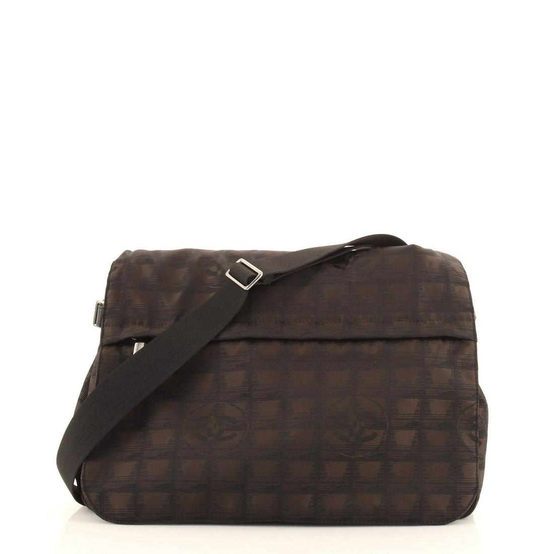 Chanel - Travel Line Messenger Bag Nylon Large: Chanel - Travel Line Messenger Bag Nylon Large Exterior Color: Brown Interior Color: Black Exterior Material: Nylon Interior Material: Nylon Hardware Color: Silver Accessories: No accessories