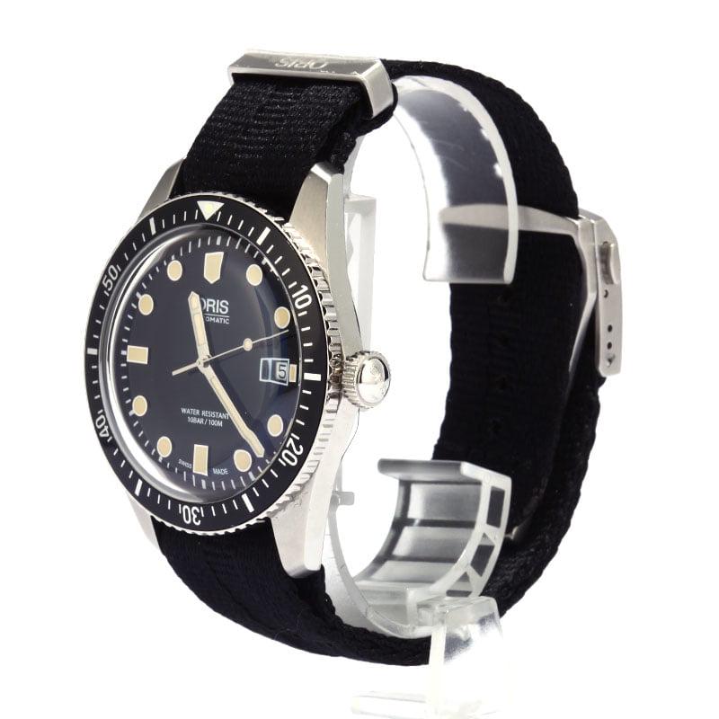 Oris Divers Sixty-Five 42mm Black Textile Strap: Oris Divers Sixty-Five 42mm Black Textile Strap Brand: Oris Item Number: 7720 4054-07 Condition: Like-New Model Name/Number: Divers Sixty Five 01 733 7720 4054-07 5 21 26FC Gender: Mens Movement: