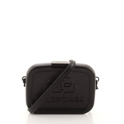 Balenciaga Logo Lunch Box Bag Plastic: Balenciaga Logo Lunch Box Bag Plastic Pre-owned - Very Good Exterior Color: Black Interior Color: Black Exterior Material: Resin Interior Material: Leather Hardware Color: Black, Matte <br