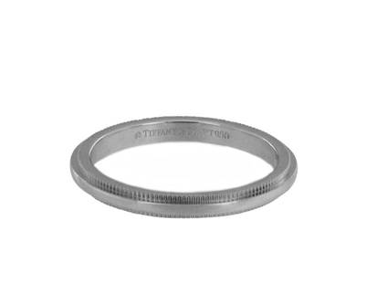 Tiffany Classic Milgrain Wedding Platinum Band Ring: Tiffany Classic Milgrain Wedding Platinum Band Ring SKU: RBJTIFFANYCLA-5FC6D6A37B82D Brand: Tiffany & Co. Condition: Pre-Owned Metal: Platinum More Details: Mint conditionPlatinumRing