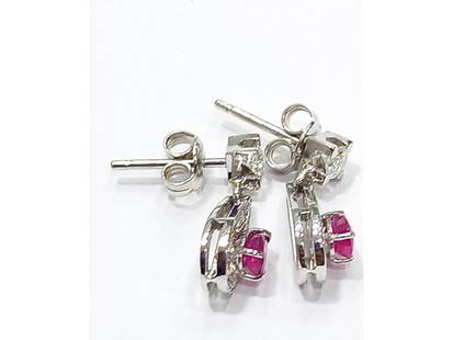 18k White Gold Ruby And Diamond Earrings: 18k White Gold Ruby And Diamond Earrings SKU: RBJRUBYANDDIA-60001D5F1D00C Brand: Made For Us Condition: Never Worn Metal: 18k White Gold Stone: Ruby & Diamond Note: All Sales are