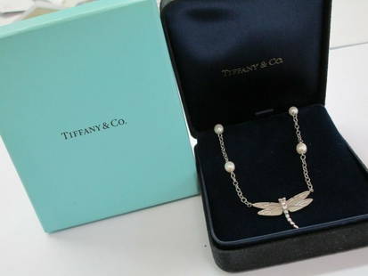 Tiffany & Co Dragonfly Pearl & Diamond Necklace 16" .08Ct: Tiffany & Co Dragonfly Pearl & Diamond Necklace 16" .08Ct SKU: RBJ363661212796-E Brand: Tiffany & Co. Condition: Pre-Owned Model: 363661212796-E Note: All Sales are final. Need more