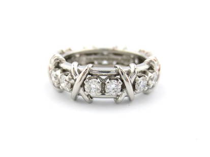 Tiffany & Co. Ring Platinum Diamond: Tiffany & Co. Ring Platinum Diamond SKU: RBJ223090671443-E Brand: Tiffany & Co. Condition: Pre-Owned Metal: Platinum Stone: Diamond Size and Fit: Ring Size: 6.5, Thickness: 7.5 mm 