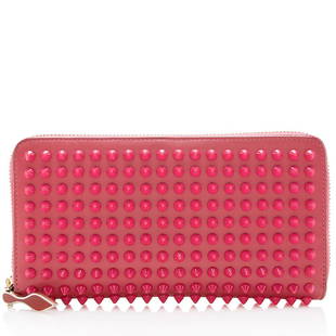 Christian Louboutin Leather Panettone Spikes Wallet: Christian Louboutin Leather Panettone Spikes Wallet Condition Quality: Good Color: Pink Height: 4 in. Length: 7.5 in. Material: Leather Width: 1 in. Item Condition: Pre Owned 