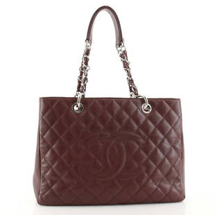 Chanel Grand Shopping Tote Quilted Caviar: Chanel Grand Shopping Tote Quilted Caviar Exterior Color: Red Interior Color: Gray Exterior Material: Leather Interior Material: Satin Hardware Color: Silver Accessories: Dust bag,