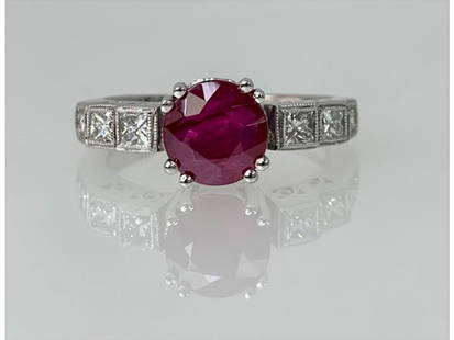14K White Gold Round Shaped Ruby Diamond Engagement Ring: 14K White Gold Round Shaped Ruby Diamond Engagement Ring SKU: RBJ14KWHITEGO-61FC2003AA5A3 Condition: Never Worn A traditional ruby ring featuring a round center stone weighing 1.90 carats accented