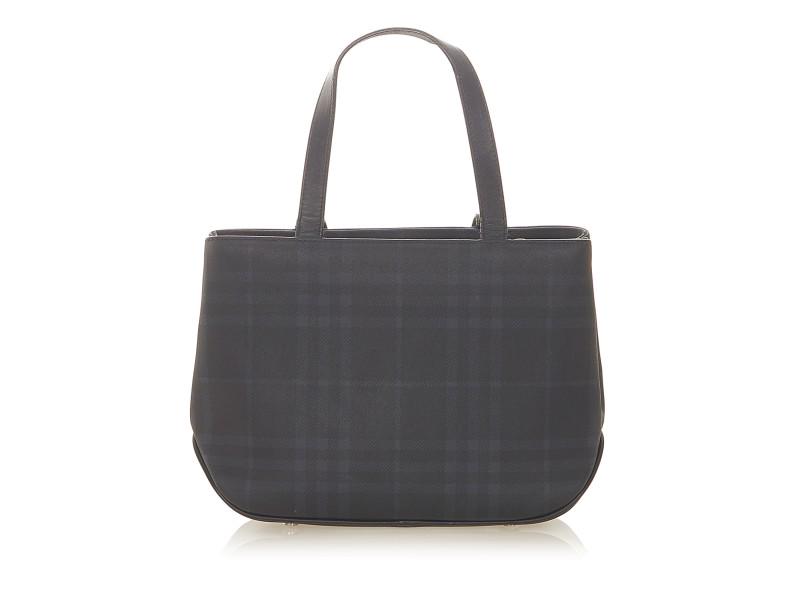 Tonal Check Handbag: Tonal Check Handbag SKU: RBJ1EBUHB007 Brand: Burberry Condition: Pre-Owned This handbag features a PVC body with leather trim, flat leather handles, an interior zip compartment, and an interior zip po