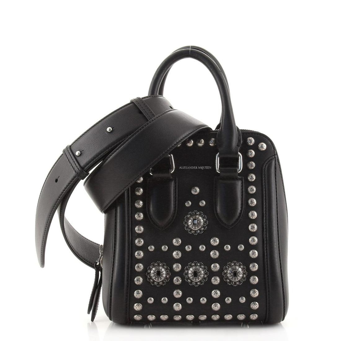 Alexander McQueen Heroine Tote Studded Leather Mini: Alexander McQueen Heroine Tote Studded Leather Mini Exterior Color: Black Interior Color: Black Exterior Material: Leather, Metal Interior Material: Suede Hardware Color: Silver Accessories: Detac