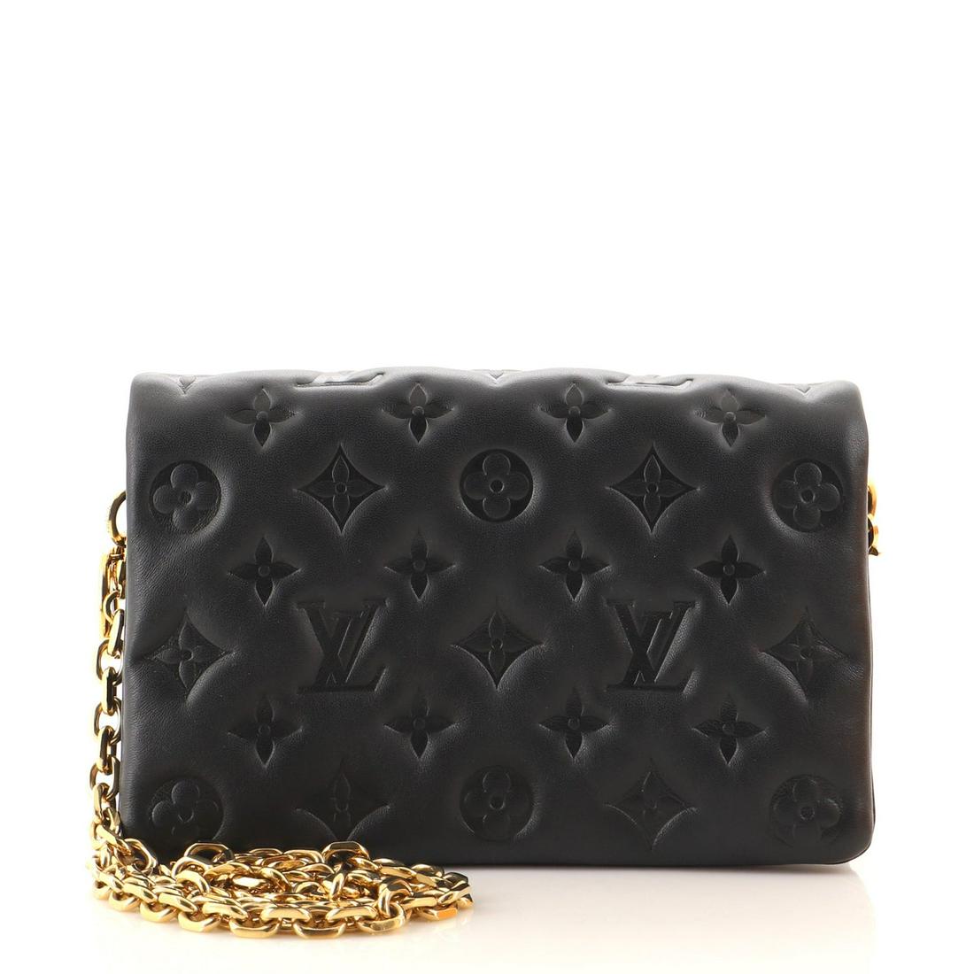 Louis Vuitton Coussin Pochette Monogram Embossed Lambskin: Louis Vuitton Coussin Pochette Monogram Embossed Lambskin Exterior Color: Black Interior Color: Pink Exterior Material: Leather Interior Material: Microfiber Hardware Color: Gold Accessories: Dust
