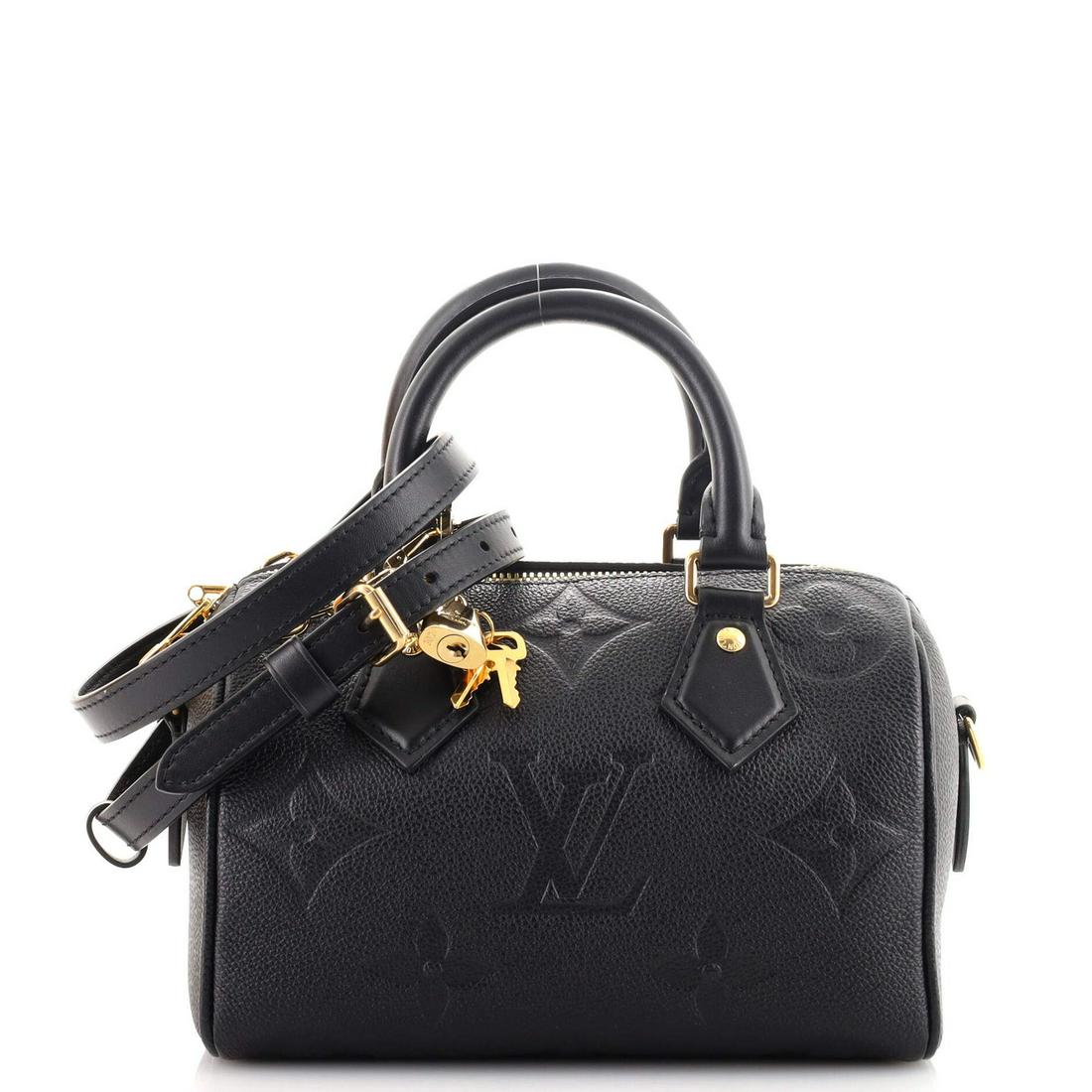 Louis Vuitton Speedy Bandouliere Bag Monogram Empreinte Giant 20: Louis Vuitton Speedy Bandouliere Bag Monogram Empreinte Giant 20 Exterior Color: Black Interior Color: Black Exterior Material: Leather Interior Material: Microfiber Hardware Color: Gold Accessori