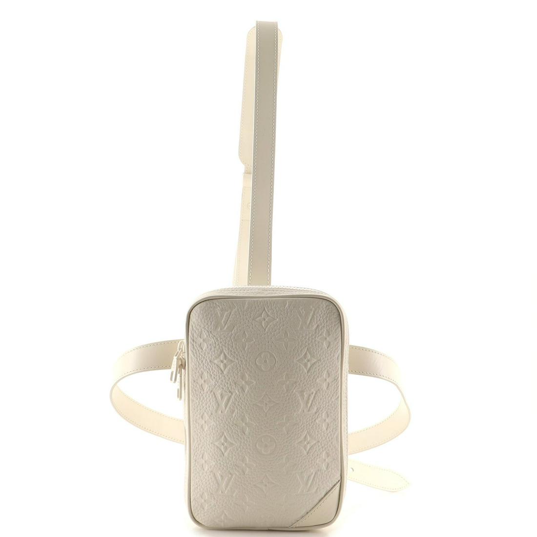 Louis Vuitton Side Utility Bag Monogram Taurillon Leather: Louis Vuitton Side Utility Bag Monogram Taurillon Leather Exterior Color: White Interior Color: Black Exterior Material: Leather Interior Material: Fabric Hardware Color: Matte, White Accessories: