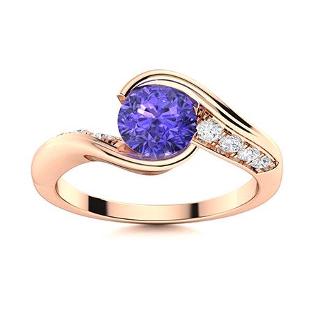 Natural 1.41 CTW Tanzanite & Diamond Engagement Ring 14K Rose Gold: Natural 1.41 CTW Tanzanite & Diamond Engagement Ring 14K Rose Gold Manufacturer's Suggested Retail Price: $3390.00 Center Stone: 1 Tanzanite @ 1.21 ctw Center Stone Color: Royal Blue Center Stone Clar