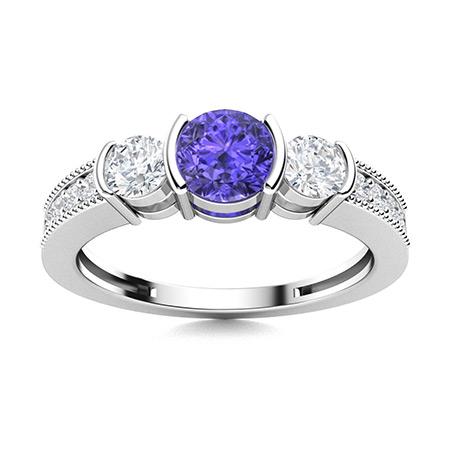 Natural 0.82 CTW Tanzanite & Diamond Engagement Ring 18K White Gold: Natural 0.82 CTW Tanzanite & Diamond Engagement Ring 18K White Gold Manufacturer's Suggested Retail Price: $3360.00 Center Stone: 1 Tanzanite @ 0.42 ctw Center Stone Color: Royal blue Center Stone Cla