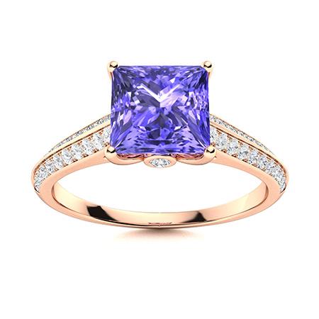 Natural 1.08 CTW Tanzanite & Diamond Engagement Ring 18K Rose Gold: Natural 1.08 CTW Tanzanite & Diamond Engagement Ring 18K Rose Gold Manufacturer's Suggested Retail Price: $3750.00 Center Stone: 1 Tanzanite @ 0.81 ctw Center Stone Color: Royal blue Center Stone Clar