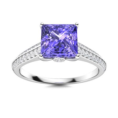Natural 1.29 CTW Tanzanite & Diamond Engagement Ring 14K White Gold: Natural 1.29 CTW Tanzanite & Diamond Engagement Ring 14K White Gold Manufacturer's Suggested Retail Price: $3930.00 Center Stone: 1 Tanzanite @ 1.02 ctw Center Stone Color: Royal blue Center Stone Cla