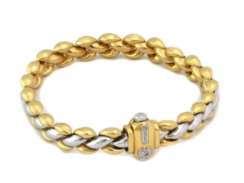 Chimento 18k Two Tone Gold Reversible Braided Puff Link Wide Bracelet: Chimento 18k Two Tone Gold Reversible Braided Puff Link Wide Bracelet Product Code: 195253063897-E Brand: Chimento Condition: Pre-Owned Model: 195253063897-E Size and Fit: Length: 7" Chimento 18k