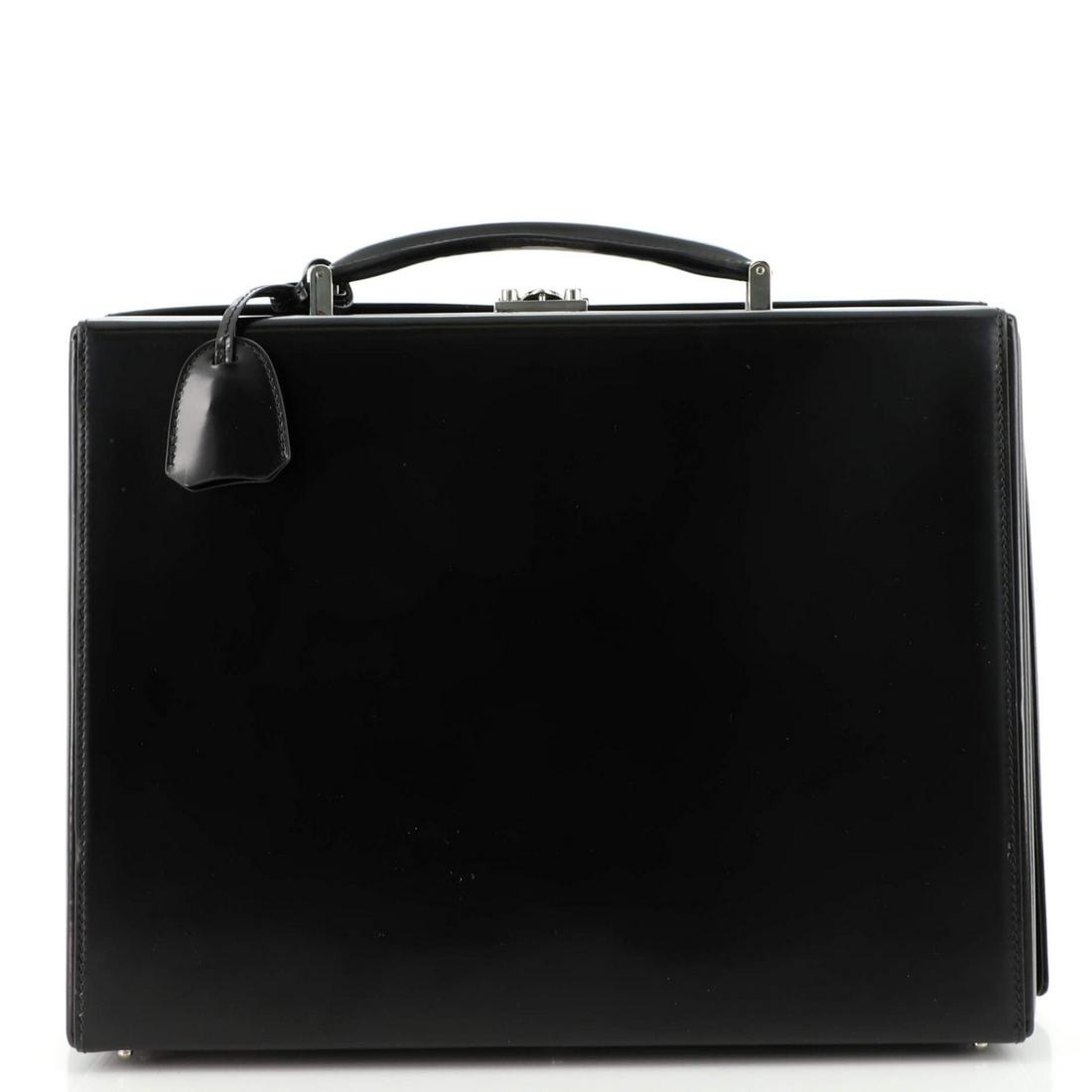 Mark Cross Grace Box Briefcase Leather Large: Mark Cross Grace Box Briefcase Leather Large Exterior Color: Black Interior Color: Red Exterior Material: Leather Interior Material: Fabric Hardware Color: Silver Accessories: No Accessories <