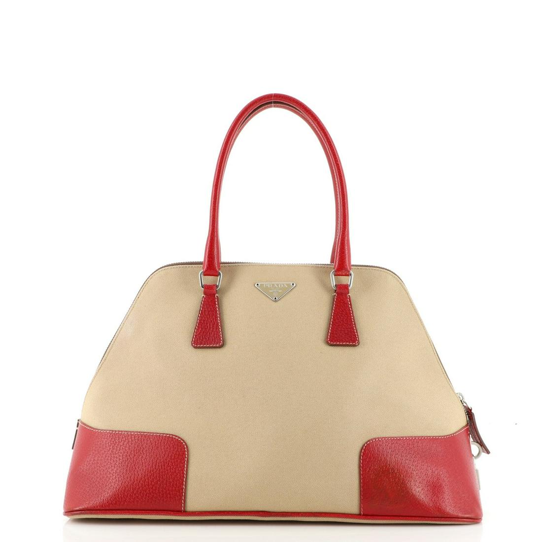 Prada Promenade Tote Canvas and Leather Large: Prada Promenade Tote Canvas and Leather Large RBJ no: HB.PR.PROT.CVL.LG Item No: 139048/1 Brand Code: 84 SIZE AND FIT: 15"W x 10"H x 6.5"D, 6" handle drop Exterior Color: Neutral, Red Interior Col