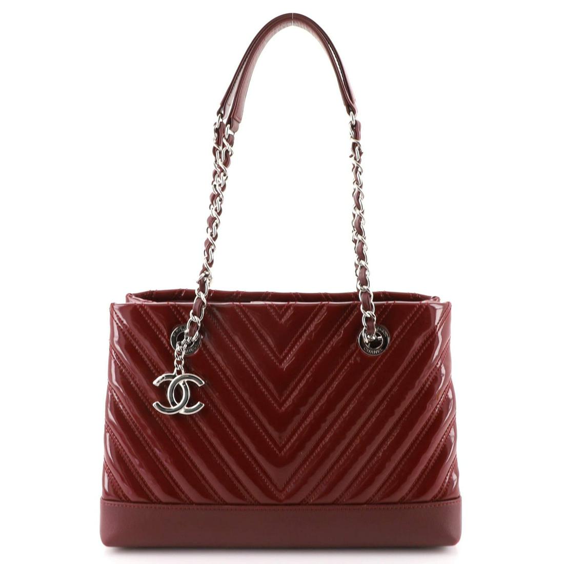 Chanel CC Charm Tote Chevron Patent Small: Chanel CC Charm Tote Chevron Patent Small Exterior Color: Red Interior Color: Red Exterior Material: Patent Leather Interior Material: Fabric Hardware Color: Silver Accessories: Authenticity card,