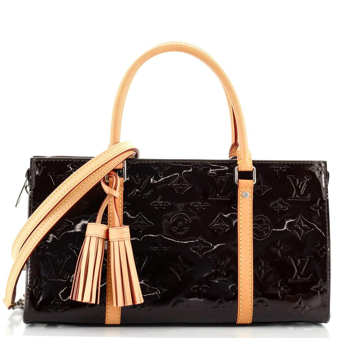 Louis Vuitton Neo Triangle Handbag Vernis: Louis Vuitton Neo Triangle Handbag Vernis Exterior Color: Red Interior Color: Red Exterior Material: Leather Interior Material: Microfiber Hardware Color: Silver Accessories: Tassel, Detachable St