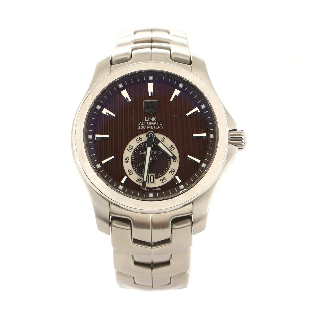 Tag Heuer Tiger Woods Link Calibre 6 Automatic Watch Stainless Steel 39: Tag Heuer Tiger Woods Link Calibre 6 Automatic Watch Stainless Steel 39 Dial Color: Brown Band Color: Silver Band Material: Stainless Steel Case Material: Stainless Steel Bezel Material: Stainless Ste