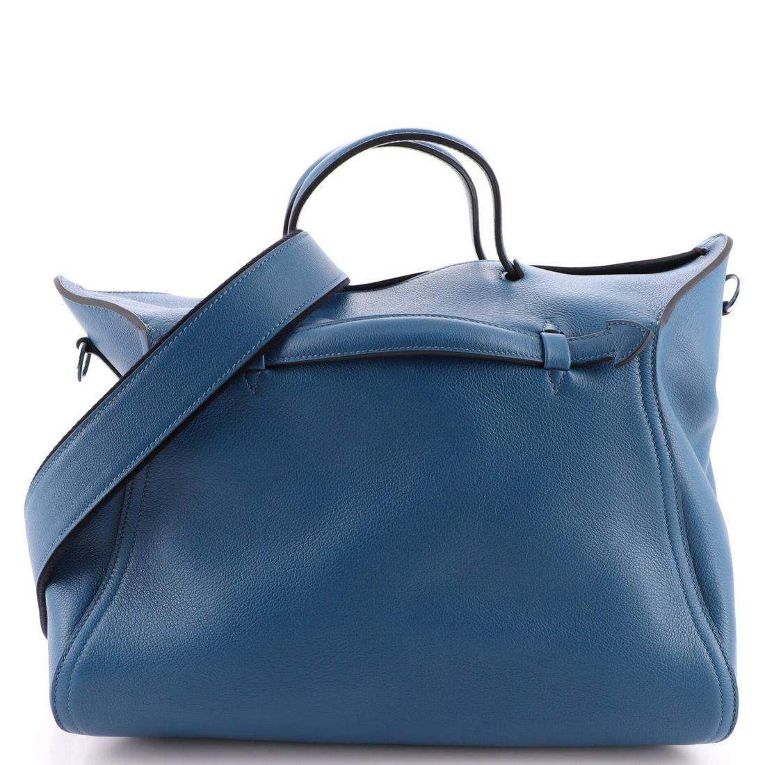 Hermes Oxer Bag Leather: Hermes Oxer Bag Leather Exterior Color: Blue Interior Color: Neutral Exterior Material: Leather Interior Material: Fabric Hardware Color: Palladium Accessories: No Accessories, Detachable Strap <b