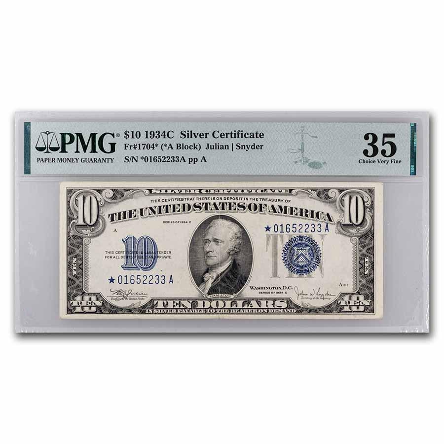 1934-C $10 Silver Certificate VF-35 PMG (Fr#1704*) Star Note: 1934-C $10 Silver Certificate VF-35 PMG (Fr#1704*) Star Note Product ID: 259116 Year: 1394C Grade: Very Fine - 35 Grade Service: PMG Denomination: 10 Dollars Mint Mark: N/A - Not Available <br