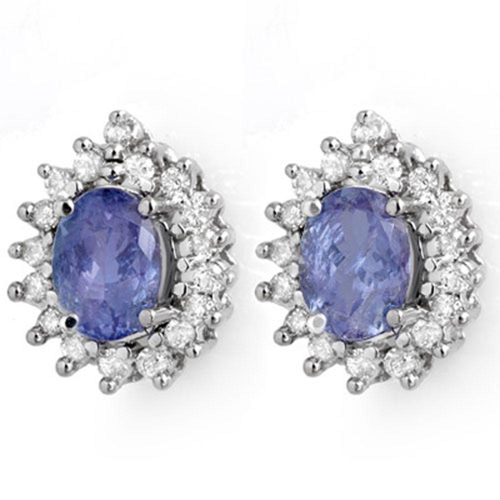 3.63 ctw Tanzanite & Diamond Earrings 14k White Gold: 3.63 ctw Tanzanite & Diamond Earrings 14k White Gold Item: Tanzanite Earring Total Gem weight: 3.63 carats Metal: Solid 14k White Gold Gold Product Weight: Approx. 5.6 grams Jewelry Note: Ear