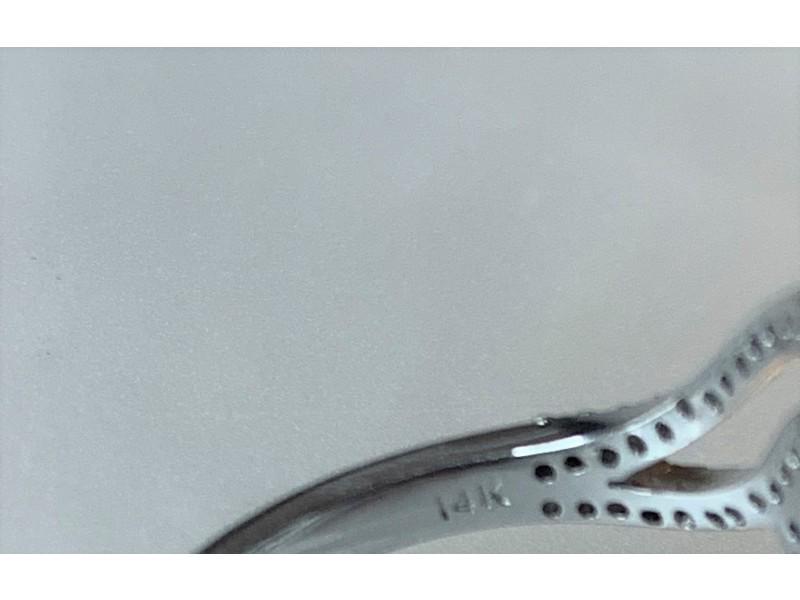 14K White Gold Oval Cut Blue Sapphire Diamond Ring $6,534 SALE: 14K White Gold Oval Cut Blue Sapphire Diamond Ring $6,534 SALE RBJ No: 14KWHITEGO-6201879026B50 Condition: Never Worn An eye catching and glamorous blue sapphire bypass ring featuring a dreamy blue el