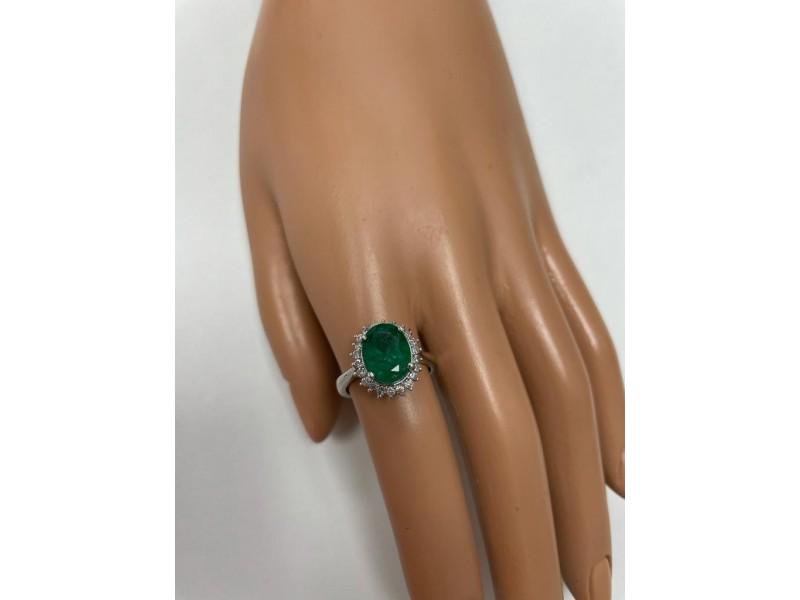 Oval-Cut Emerald And Diamond Floral Halo Ring In 14K White Gold: Oval-Cut Emerald And Diamond Floral Halo Ring In 14K White Gold Product Code: 14KWHITEGO-62840839C9300 Condition: Never Worn Final Sale: THIS ITEM IS FINAL SALE AND NOT RETURNABLE. ---- At the core of