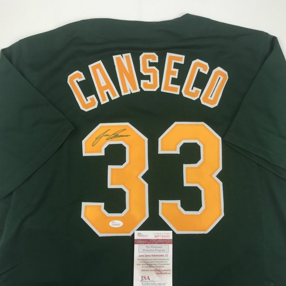 Autographed/Signed JOSE CANSECO Oakland Dark Green Baseball Jersey JSA COA Auto: Autographed/Signed JOSE CANSECO Oakland Dark Green Baseball Jersey JSA COA Auto Autographed/Signed JOSE CANSECO Oakland Dark Green Baseball Jersey JSA COA Auto