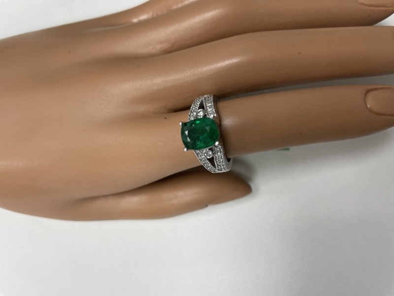 Emerald And Diamond Accent Ring In 14K White Gold: Emerald And Diamond Accent Ring In 14K White Gold Product Code: 14KWHITEGO-62850882CF22E Condition: Never Worn Final Sale: THIS ITEM IS FINAL SALE AND NOT RETURNABLE. Crafted in 14K, luxurious cushion