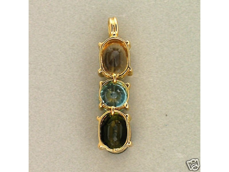 Vintage 18k Gold Oval Smoky Quartz Round Blue Zircon Green Tourmaline Pendant: Vintage 18k Gold Oval Smoky Quartz Round Blue Zircon Green Tourmaline Pendant Product Code: 367-2-851-01C9A Condition: Never Worn Final Sale: THIS ITEM IS FINAL SALE AND NOT RETURNABLE. Stone: Yellow