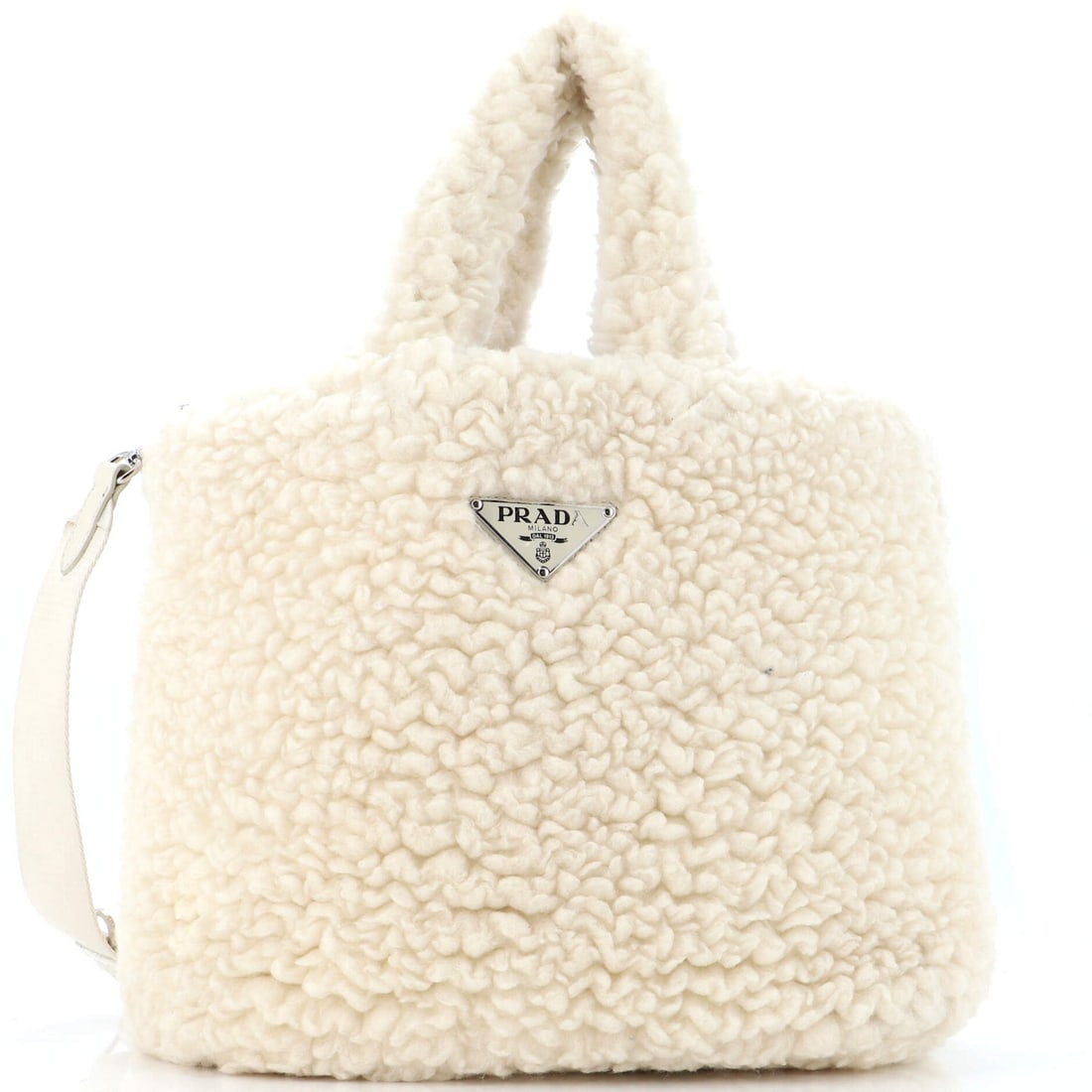Prada Convertible Open Tote Wool and Cashmere: Prada Convertible Open Tote Wool and Cashmere Exterior Color: White Interior Color: Neutral Exterior Material: Cashmere, Wool Interior Material: Fabric Hardware Color: Silver Accessories: Dust bag