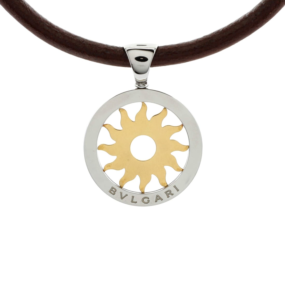 Bvlgari Tondo Sun Pendant Necklace: Bvlgari Tondo Sun Pendant Necklace Stainless Steel with 18K Yellow Gold and Cord Description: Metal Type: 18K Yellow Gold, Stainless Steel Metal Finish: High Polish Hallmarks Type: 750, Registered Tra