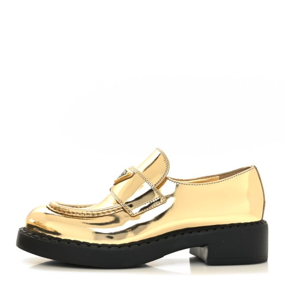 Prada Metallic Brushed Calfskin Metal Triangle Logo 50mm Loafers 38.5 Platino: Prada Metallic Brushed Calfskin Metal Triangle Logo 50mm Loafers 38.5 Platino SKU no: RBJ1374222 Brand: PRADA Condition: Excellent Condition Details: Other: Scuffs at soles, Exterior: Faint scuffs Siz