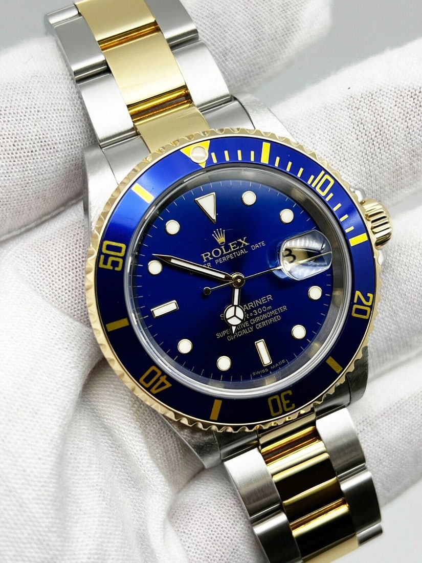 Rolex 16613 Submariner Blue Dial: Rolex 16613 Submariner Blue Dial 18K Yellow Gold Stainless 2006 Box Paper BRAND: Rolex Period: 2000-2009 Date of Manufacture: 2006 Condition: Excellent. In original box. Style Number: 16613 <