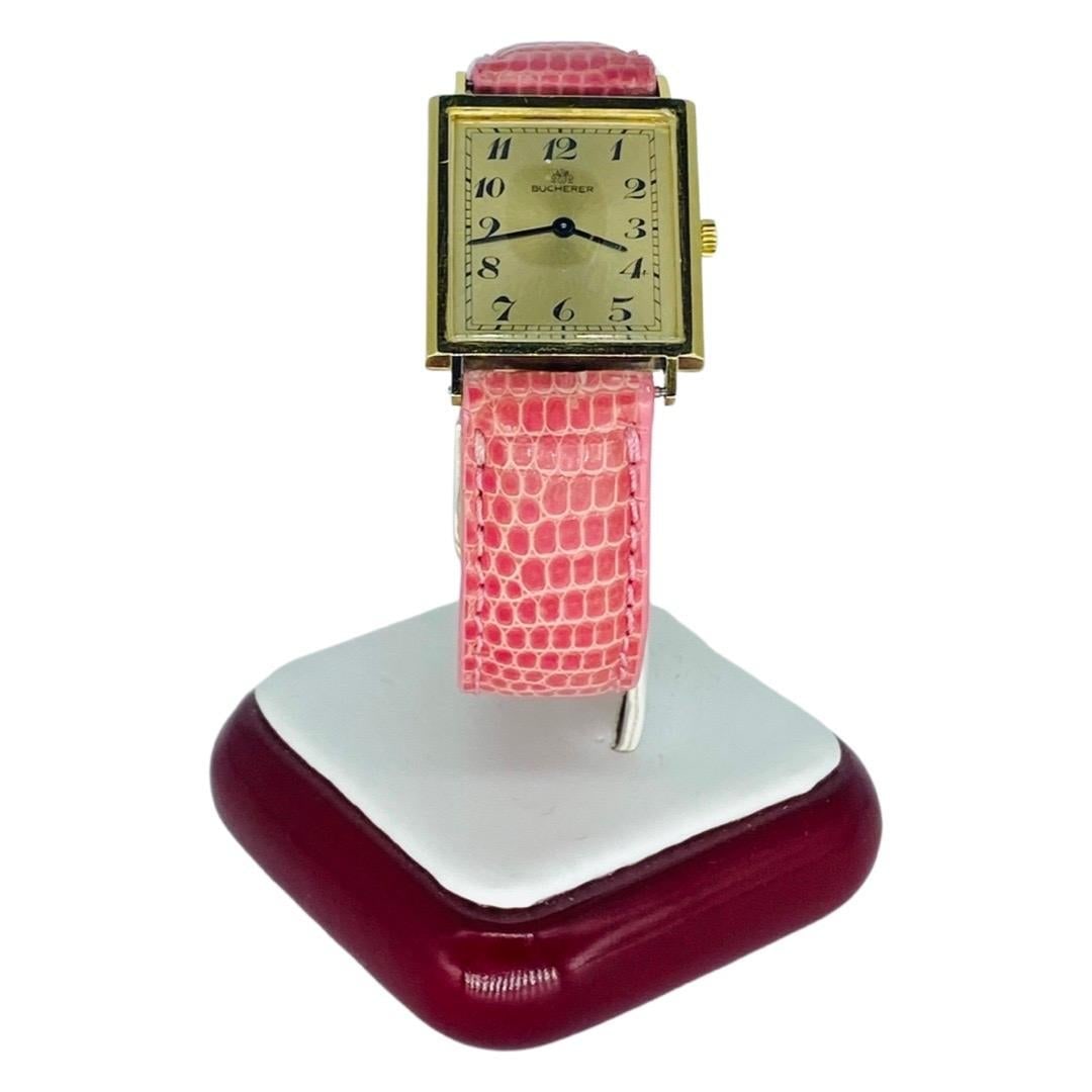 Vintage Bucherer 24mm 18k Gold: Vintage Bucherer 24mm 18k Gold Women?s Wrist Watch BRAND: Bucherer Case Material: 18k Gold, Yellow Gold Strap Material: Lizard Case Shape: Rectangle Movement: Quartz Case Dimensions: Width: 0.95 i