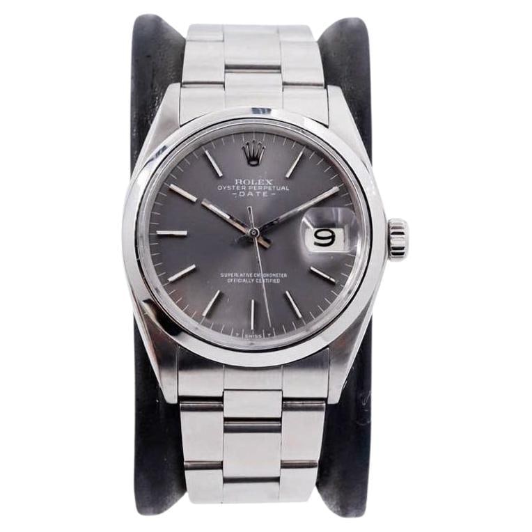 Rolex Stainless Steel Oyster Perpetual: Rolex Stainless Steel Oyster Perpetual Date with Factory Original Charcoal Dial Brand: Rolex Strap Material: Stainless Steel Case Shape: Round Style: Modern Place of Origin: Switzerland Period: 19