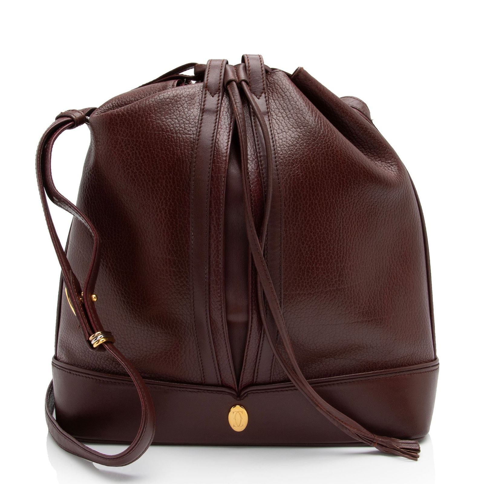 Cartier Vintage Leather Drawstring Bucket: Cartier Vintage Leather Drawstring Bucket Bag Condition Quality: Light creasing and scuffs throughout exterior and shoulder strap. Light warping throughout shoulder strap. Light surface scratches to h