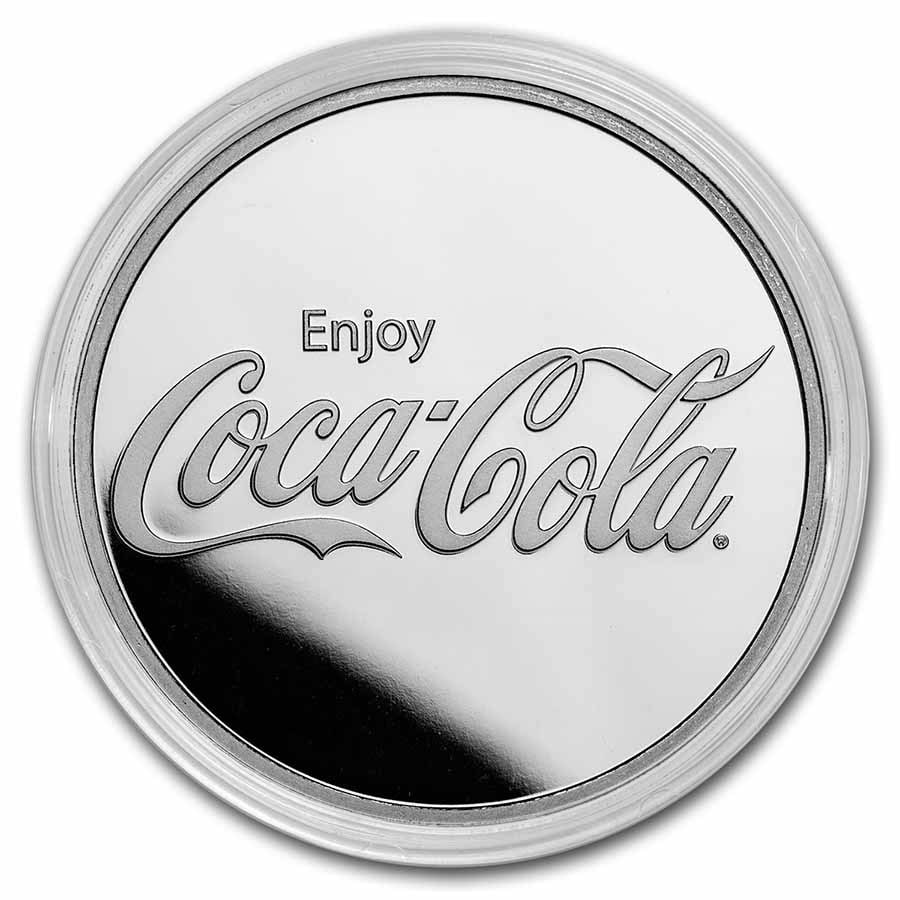 Coca-Cola 1 oz Silver Struck Round: Coca-Cola 1 oz Silver Struck Round (In Capsule) SKU no: RBJ282482 Grade: None Grade Service: None Mint Mark: N/A - Not Available Metal Content: 1 troy oz Purity: .999 Thickness: 2.8 mm