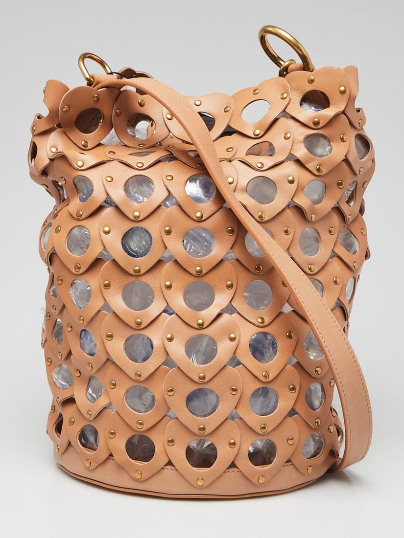Yves Saint Laurent Brown Leather Studded: Yves Saint Laurent Brown Leather Studded Seau Coeur Bucket Bag Overall Condition: Like new Exterior Condition: Like new Interior Condition: Like new Designer: Yves Saint Laurent Material: Beige leathe