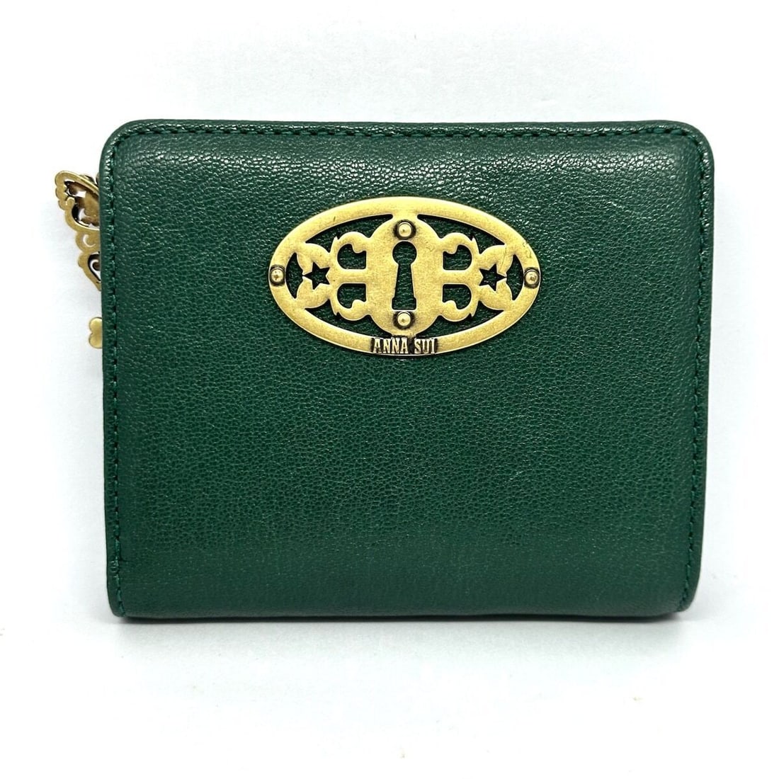 Auth ANNA SUI - Dark Green: Auth ANNA SUI - Dark Green Leather Bifold Wallet Condition: Pre-owned Brand: ANNA SUI Style: Bifold Wallet Color: Dark Green Material: Leather ConditionRank: 6 Department: Women