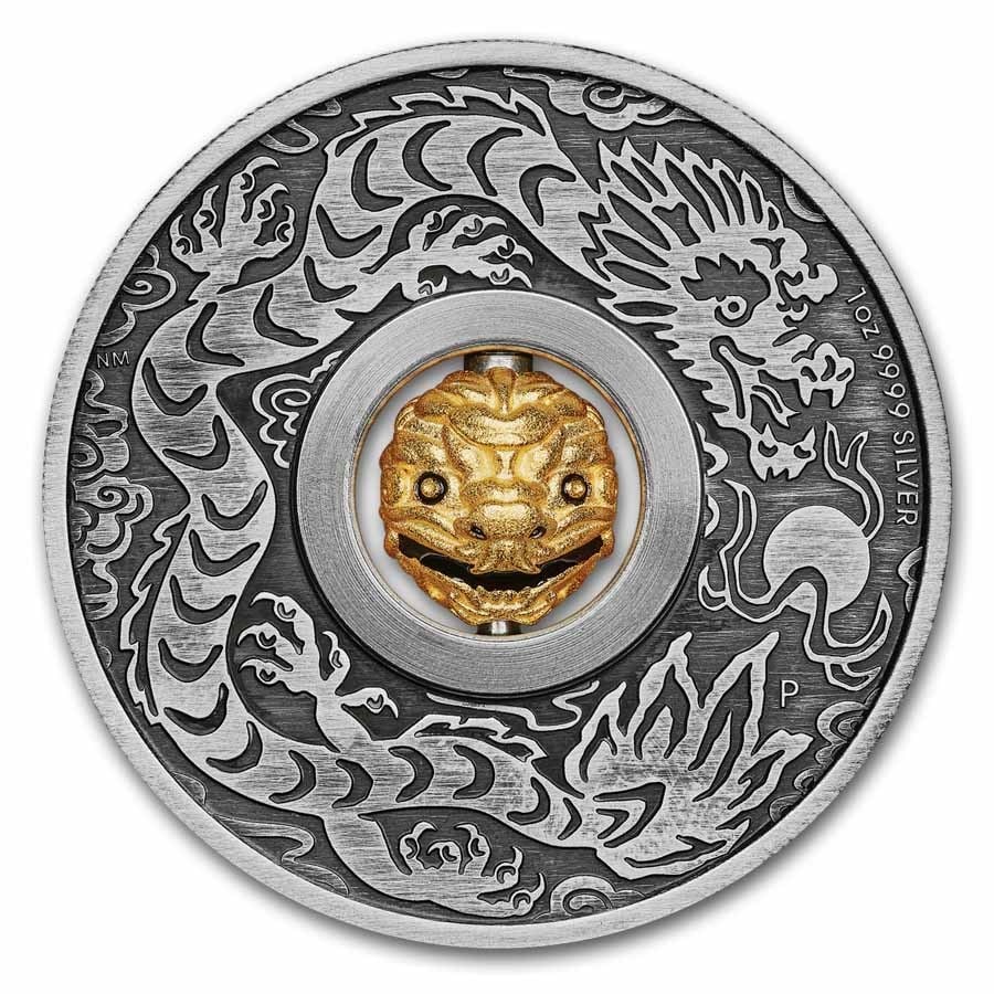 2024 Tuvalu 1 oz Ag Year: 2024 Tuvalu 1 oz Ag Year of the Dragon Rotating Charm Antiqued SKU no: RBJ291599 Year: 2024 Grade: Uncirculated Grade Service: None Denomination: 1 Dollar Mint Mark: P - Perth Metal Conte