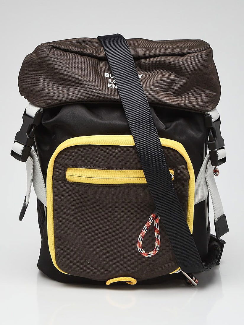 BURBERRY Brown/Black Nylon Leo Belt Pouch: BURBERRY Brown/Black Nylon Leo Belt Pouch Crossbody Bag Overall Condition: New Exterior Condition: New Interior Condition: New Designer: Burberry Material: Black and Brown nylon Includes: Burberry