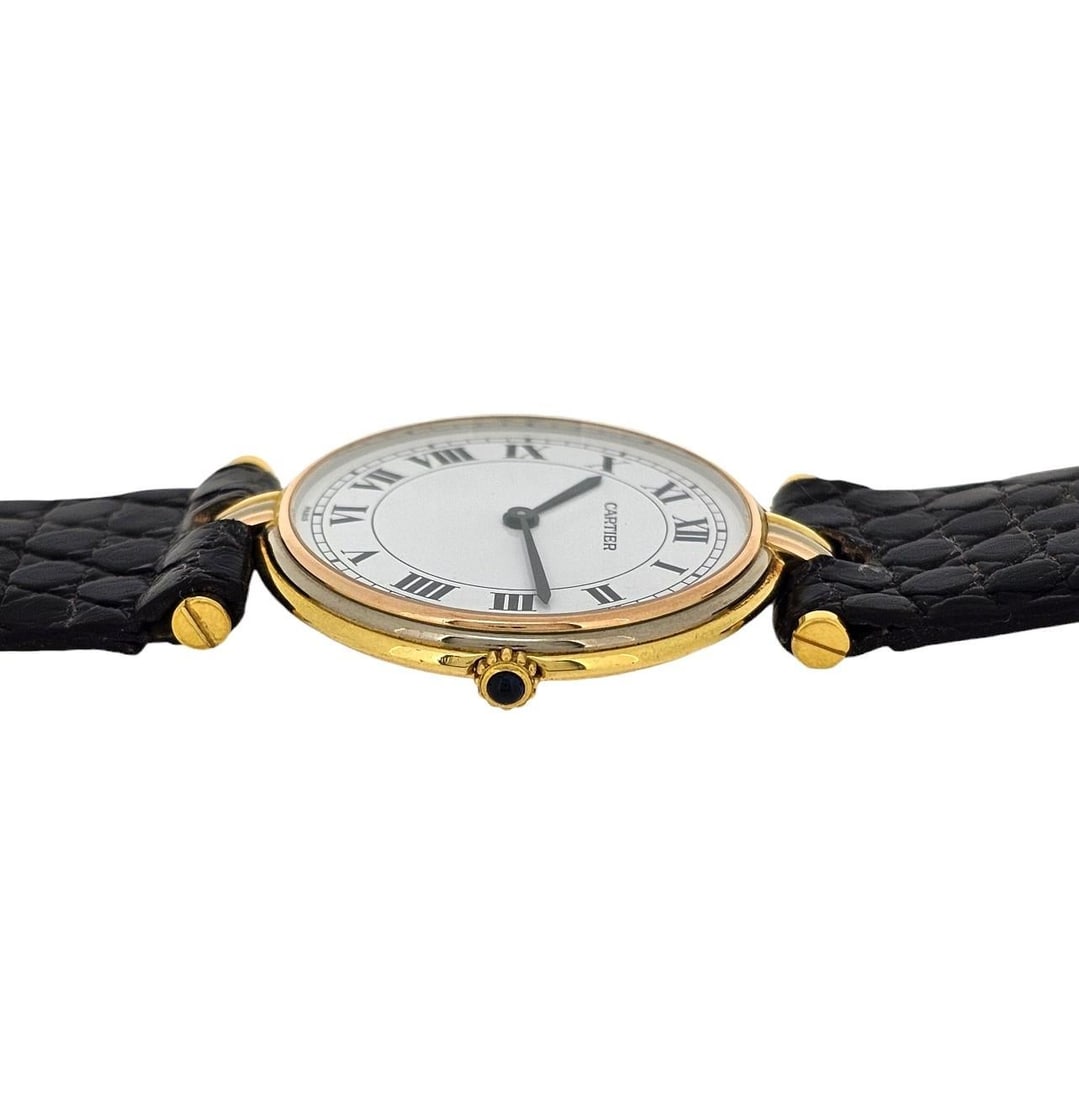 Cartier Paris Vendome LC Trinity GM: Cartier Paris Vendome LC Trinity GM large size watch 18K Tri- Color Circa 1980S Brand: Cartier Case Material: 18k Gold Strap Material: Lizard Movement: Quartz Case Dimensions: Height: 1.42 in (36 mm)