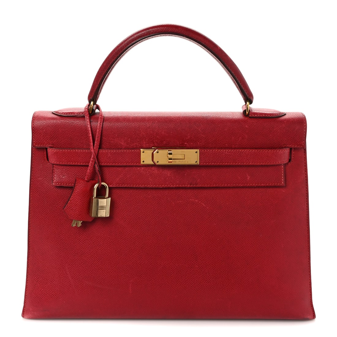 Hermes Courchevel Kelly Sellier 32 Rouge: Hermes Courchevel Kelly Sellier 32 Rouge Vif Brand: HERMES Condition: Worn Condition Details: Exterior: Corner wear, scuffs, faded area(s), smoothing of leather, edge wear, marks, imprints, popped sti